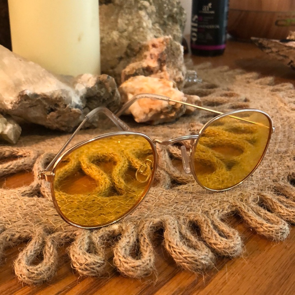Urban outfitters yellow tinted glasses.